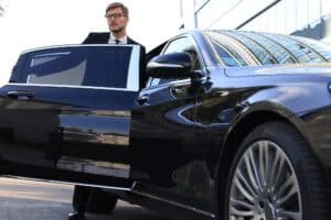 Read more about the article The Benefits of Choosing a Professional Chauffeur for Your Next Journey
